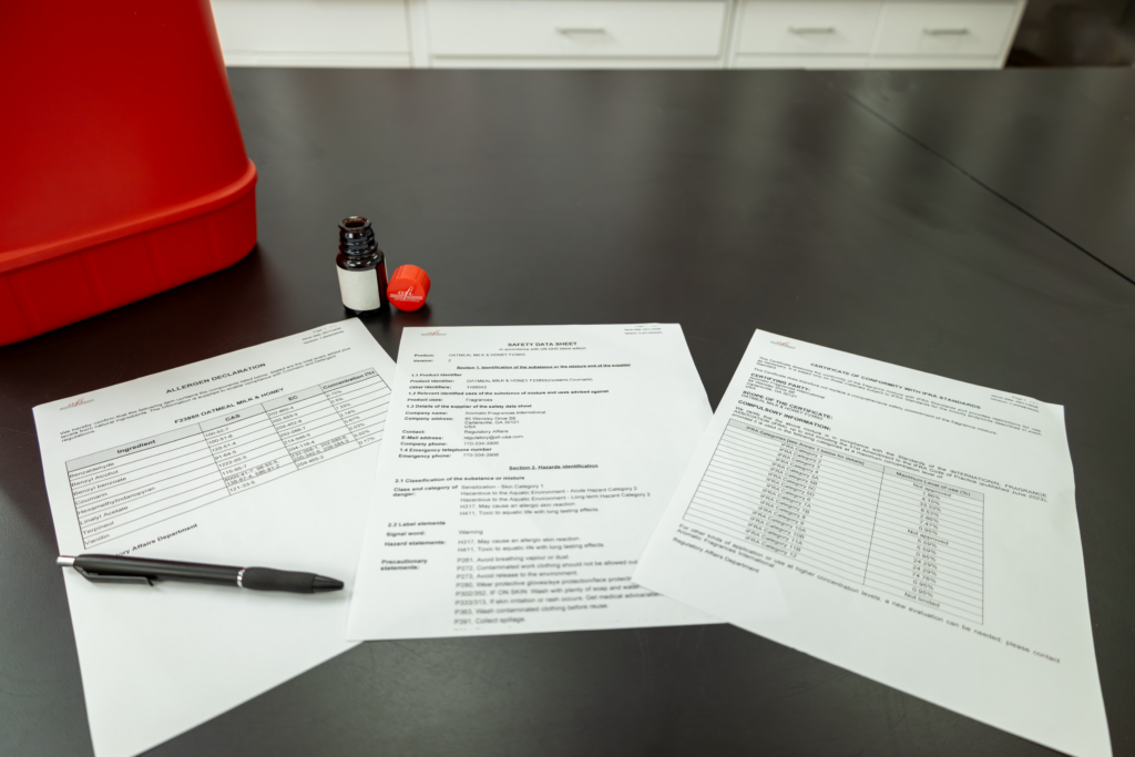 fragrance documentation laid out on work surface